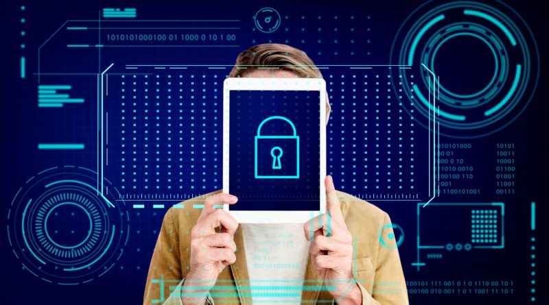 Person holding tablet with digital lock icon representing data privacy compliance and cybersecurity requirements