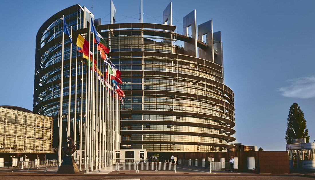 European Parliament building in Strasbourg with EU member-state flags