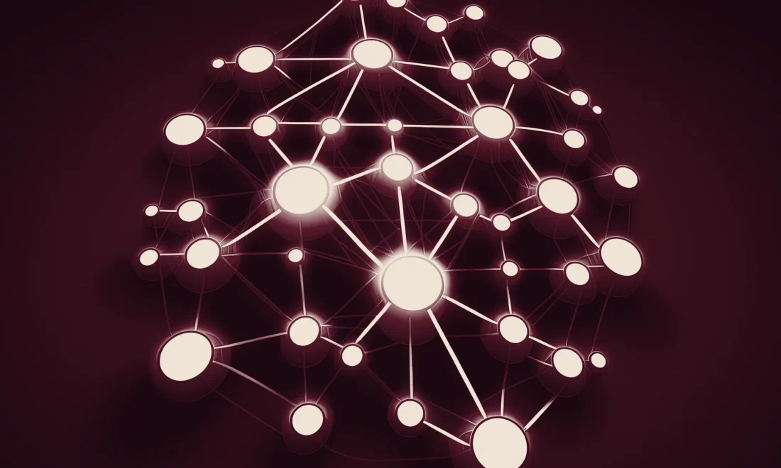 Glowing node-and-link knowledge graph on a deep wine background representing a governed data ontology layer