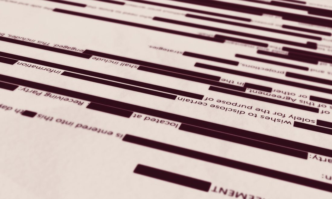 A document with lines of text where the identifying names are blacked out