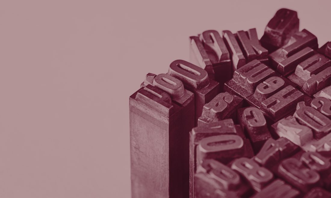 Block of composed letterpress metal type, standing in for a robots.txt file generated from a dashboard policy
